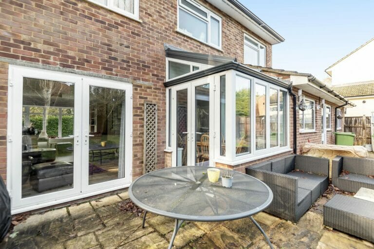 Far shot of conservatory and French doors