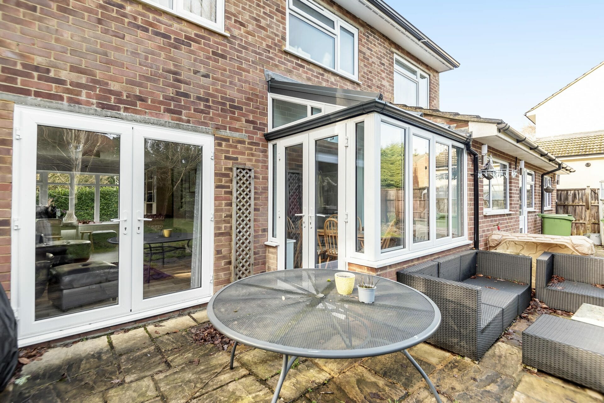 Far shot of conservatory and french doors