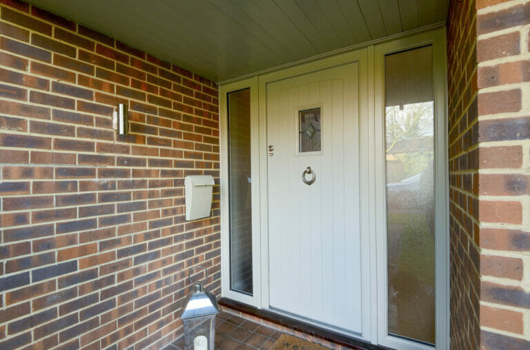 Solidor composite front door - Three Counties installation of composite front doors with side panels.