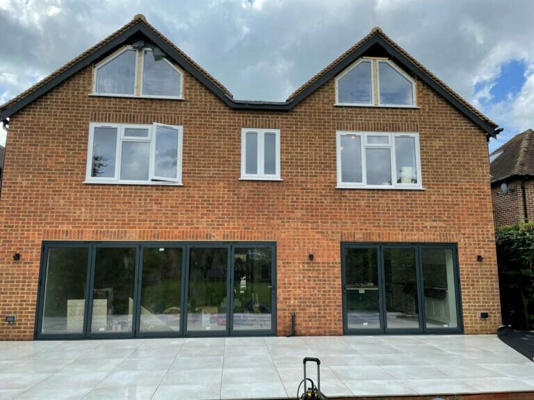 Three Counties installation of aluminium bi-fold doors, by ALUK. Rear elevation.