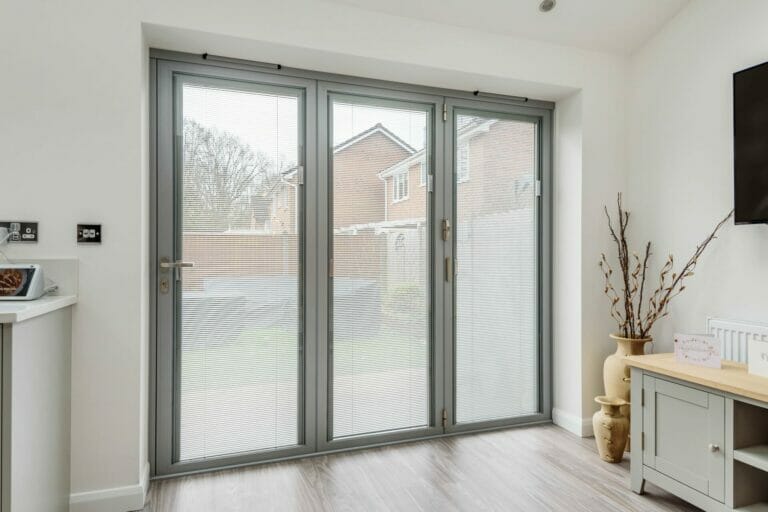 bifold doors, between the glass blinds