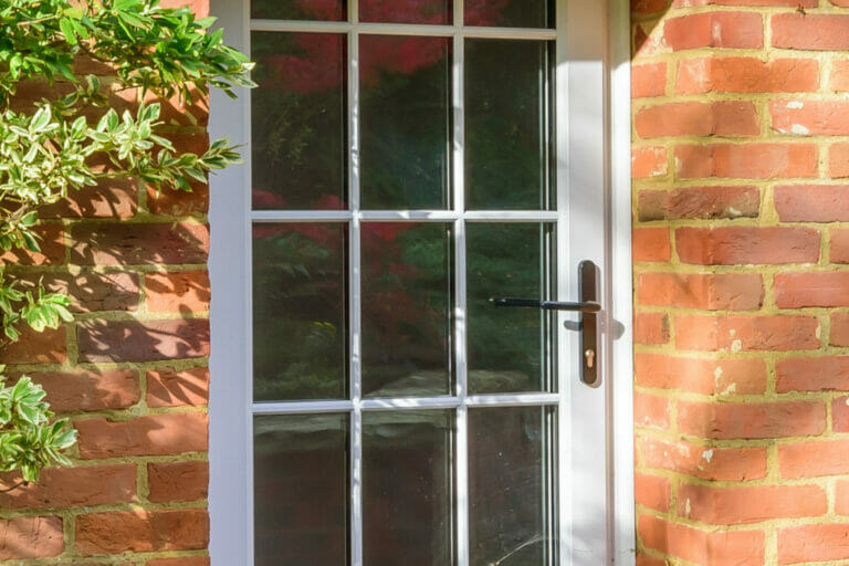 uPVC front doors with full length glass panels, by Three Counties