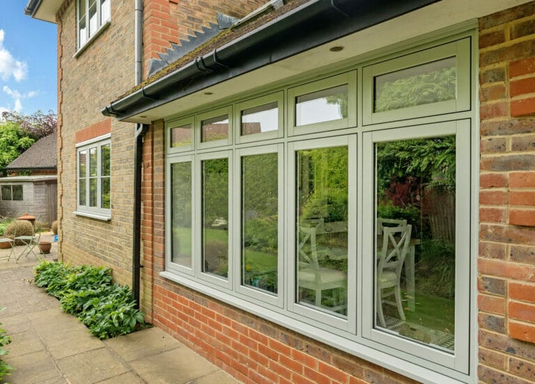 A close up photograph of a wide window of the property in this Spotlight Installation by Three Counties