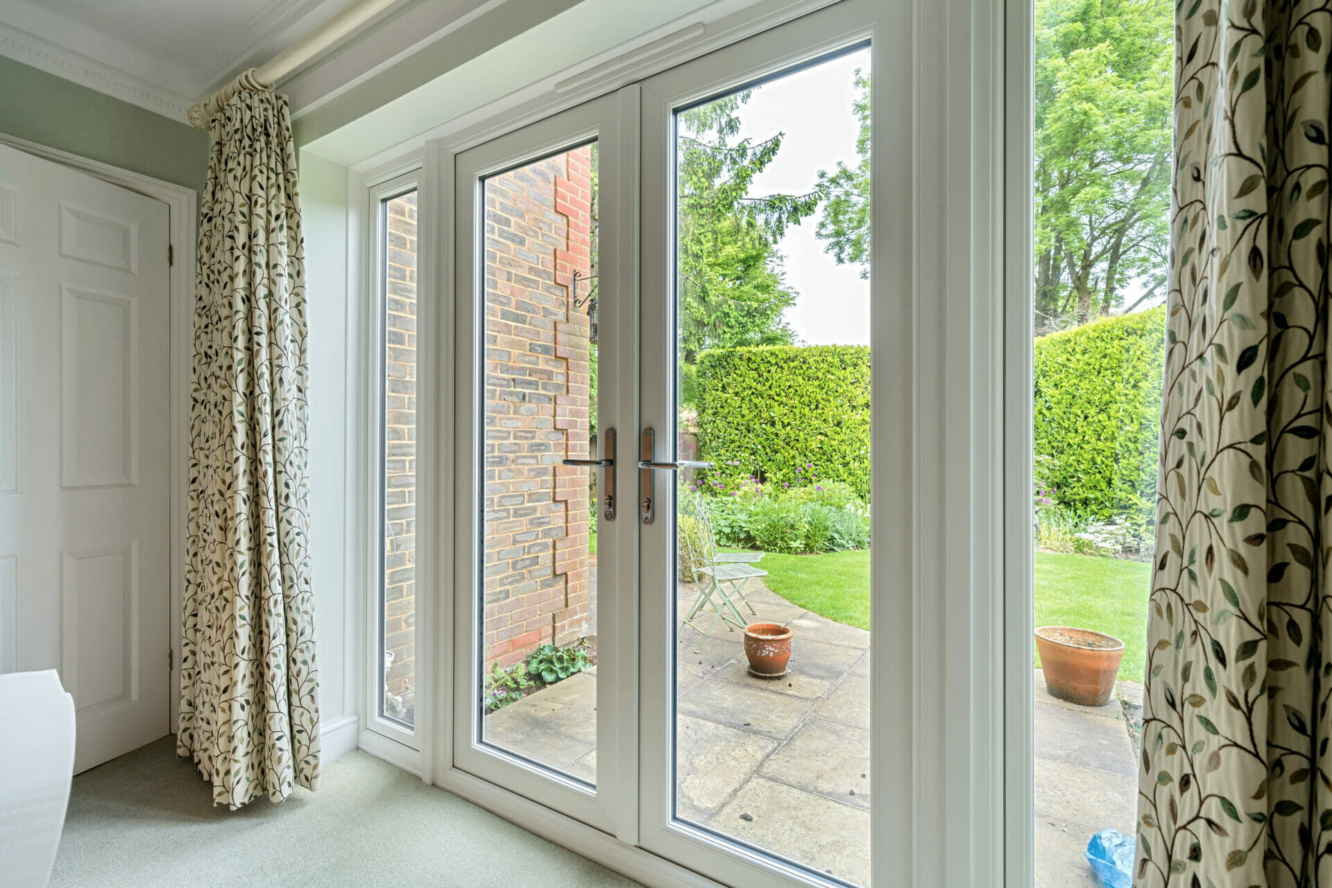 A photo of a Agate grey flush casement window from inside, which has white upvc